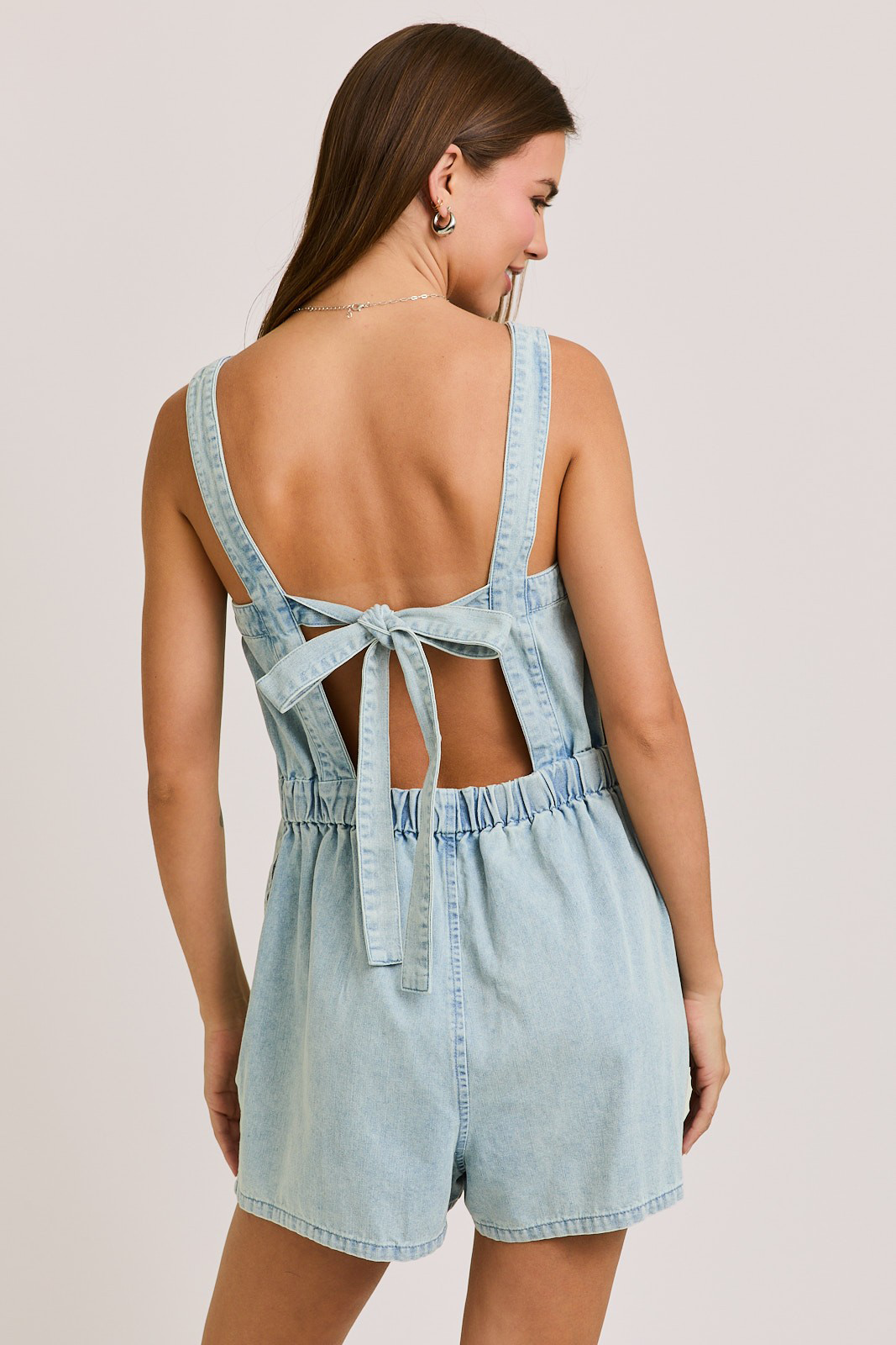 Back Tie Denim Romper in Light Wash